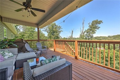 Tucked into the wooded hills of Bella Vista, this home delivers on Bella Vista Country Club - Highlands in Arkansas - for sale on GolfHomes.com, golf home, golf lot