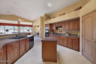 This lovely home on a golf course lot offers the perfect blend on Arizona Traditions Golf Club in Arizona - for sale on GolfHomes.com, golf home, golf lot