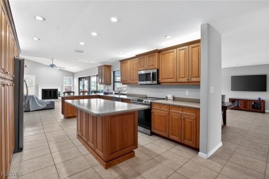 Experience the essence of Florida living in this beautifully on Spanish Wells Golf and Country Club in Florida - for sale on GolfHomes.com, golf home, golf lot
