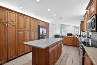 Experience the essence of Florida living in this beautifully on Spanish Wells Golf and Country Club in Florida - for sale on GolfHomes.com, golf home, golf lot