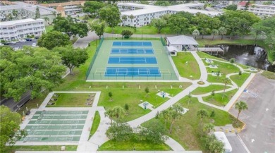 RENOVATIONS ARE COMPLETE AND THE RESULTS ARE STUNNING!  Water on On Top Of The World Golf Course in Florida - for sale on GolfHomes.com, golf home, golf lot