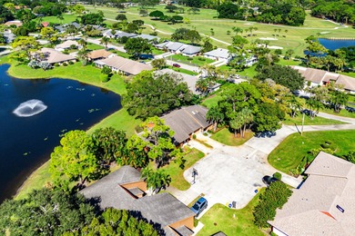 Discover the perfect turnkey retreat in the heart of Eastpointe on Eastpointe Country Club in Florida - for sale on GolfHomes.com, golf home, golf lot