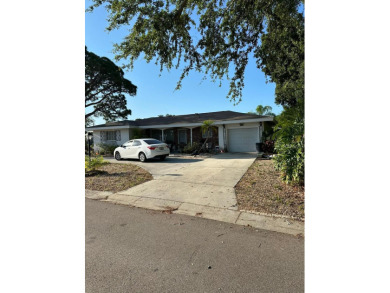 Investor Alert: 2 bedroom, 2 bathroom home featuring an open on Palm Aire Country Club of Sarasota in Florida - for sale on GolfHomes.com, golf home, golf lot