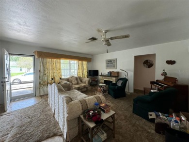 Investor Alert: 2 bedroom, 2 bathroom home featuring an open on Palm Aire Country Club of Sarasota in Florida - for sale on GolfHomes.com, golf home, golf lot