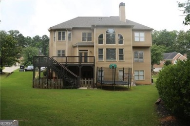 Discover the epitome of luxury living in this elegant on Brookstone Golf and Country Club in Georgia - for sale on GolfHomes.com, golf home, golf lot