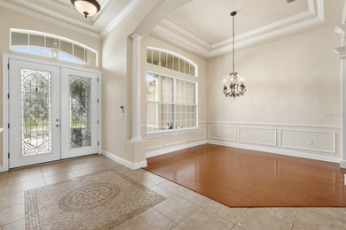 One or more photo(s) has been virtually staged. Short Sale on The Grand Club Cypress Course in Florida - for sale on GolfHomes.com, golf home, golf lot