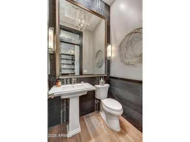 This iconic former Monterey Model Home sits majestically on an on Vista Verde Golf Course in Arizona - for sale on GolfHomes.com, golf home, golf lot