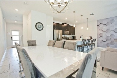 Fully furnished and decorated 4BR/3BA pool home in the on The Oasis Club at Champions Gate in Florida - for sale on GolfHomes.com, golf home, golf lot