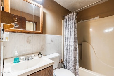 With some TLC, this home could shine again--but the best part? on The Hideout Golf in Pennsylvania - for sale on GolfHomes.com, golf home, golf lot