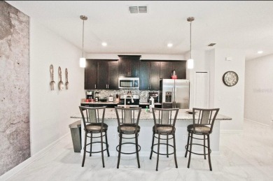 Fully furnished and decorated 4BR/3BA pool home in the on The Oasis Club at Champions Gate in Florida - for sale on GolfHomes.com, golf home, golf lot