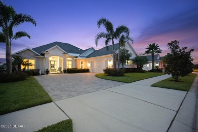 Prepare to be captivated by this luxurious lakefront masterpiece on Venetian Bay Golf Course in Florida - for sale on GolfHomes.com, golf home, golf lot