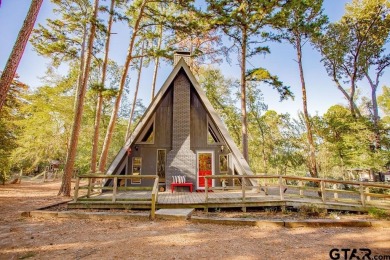 This charming A-frame home is perfectly priced for first time on Hide-A-Way Lake Golf Course in Texas - for sale on GolfHomes.com, golf home, golf lot