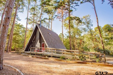 This charming A-frame home is perfectly priced for first time on Hide-A-Way Lake Golf Course in Texas - for sale on GolfHomes.com, golf home, golf lot