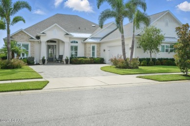Prepare to be captivated by this luxurious lakefront masterpiece on Venetian Bay Golf Course in Florida - for sale on GolfHomes.com, golf home, golf lot