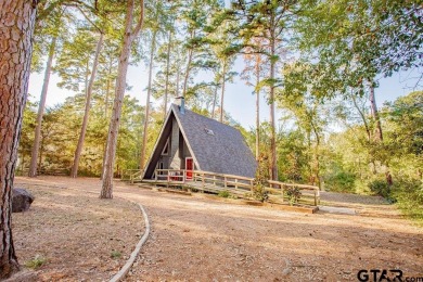 This charming A-frame home is perfectly priced for first time on Hide-A-Way Lake Golf Course in Texas - for sale on GolfHomes.com, golf home, golf lot