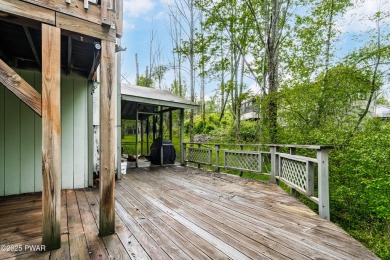 With some TLC, this home could shine again--but the best part? on The Hideout Golf in Pennsylvania - for sale on GolfHomes.com, golf home, golf lot