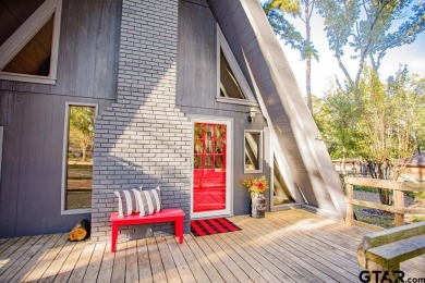 This charming A-frame home is perfectly priced for first time on Hide-A-Way Lake Golf Course in Texas - for sale on GolfHomes.com, golf home, golf lot