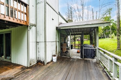 With some TLC, this home could shine again--but the best part? on The Hideout Golf in Pennsylvania - for sale on GolfHomes.com, golf home, golf lot