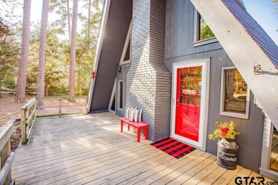 This charming A-frame home is perfectly priced for first time on Hide-A-Way Lake Golf Course in Texas - for sale on GolfHomes.com, golf home, golf lot