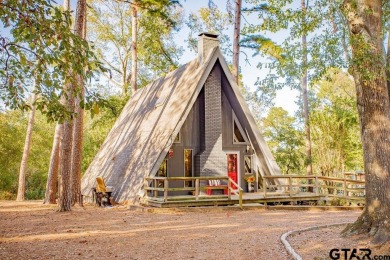 This charming A-frame home is perfectly priced for first time on Hide-A-Way Lake Golf Course in Texas - for sale on GolfHomes.com, golf home, golf lot