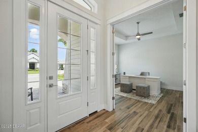 Prepare to be captivated by this luxurious lakefront masterpiece on Venetian Bay Golf Course in Florida - for sale on GolfHomes.com, golf home, golf lot