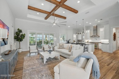 Prepare to be captivated by this luxurious lakefront masterpiece on Venetian Bay Golf Course in Florida - for sale on GolfHomes.com, golf home, golf lot