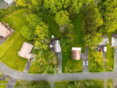 With some TLC, this home could shine again--but the best part? on The Hideout Golf in Pennsylvania - for sale on GolfHomes.com, golf home, golf lot