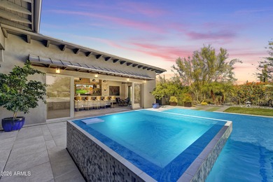 This iconic former Monterey Model Home sits majestically on an on Vista Verde Golf Course in Arizona - for sale on GolfHomes.com, golf home, golf lot