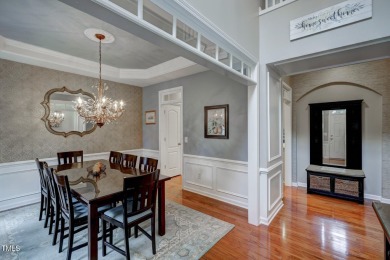 Beautiful home in Wakefield backing up to the executive golf on TPC at Wakefield Plantation in North Carolina - for sale on GolfHomes.com, golf home, golf lot