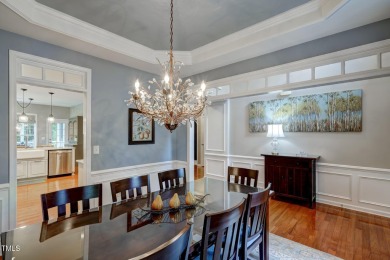 Beautiful home in Wakefield backing up to the executive golf on TPC at Wakefield Plantation in North Carolina - for sale on GolfHomes.com, golf home, golf lot