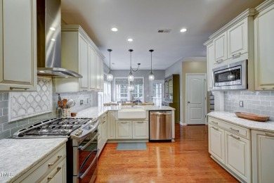 Beautiful home in Wakefield backing up to the executive golf on TPC at Wakefield Plantation in North Carolina - for sale on GolfHomes.com, golf home, golf lot