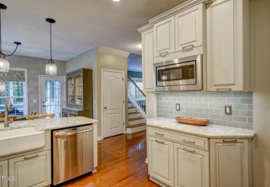 Beautiful home in Wakefield backing up to the executive golf on TPC at Wakefield Plantation in North Carolina - for sale on GolfHomes.com, golf home, golf lot