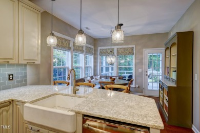 Beautiful home in Wakefield backing up to the executive golf on TPC at Wakefield Plantation in North Carolina - for sale on GolfHomes.com, golf home, golf lot
