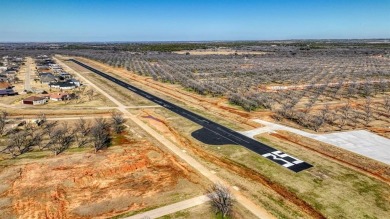 Dream Home Lot at The Landings Airpark! Seize the opportunity to on Pecan Plantation Country Club in Texas - for sale on GolfHomes.com, golf home, golf lot