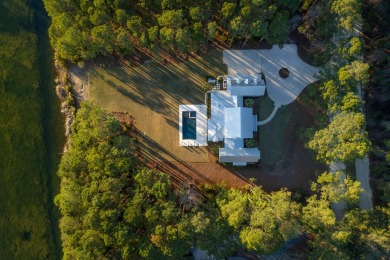 Welcome to 821 Bulls Bay Blvd, a stunning custom-built estate on Bulls Bay Golf Club in South Carolina - for sale on GolfHomes.com, golf home, golf lot