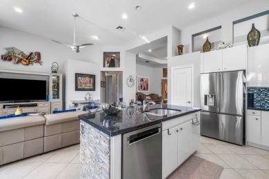Paradise and a FULL GOLF MEMBERSHIP await you at 138 Isle Drive! on BallenIsles Golf and Country Club in Florida - for sale on GolfHomes.com, golf home, golf lot