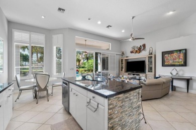 Paradise and a FULL GOLF MEMBERSHIP await you at 138 Isle Drive! on BallenIsles Golf and Country Club in Florida - for sale on GolfHomes.com, golf home, golf lot