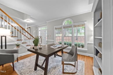 Nestled on a desirable corner lot, surrounded by mature trees in on Devils Ridge Golf Club in North Carolina - for sale on GolfHomes.com, golf home, golf lot