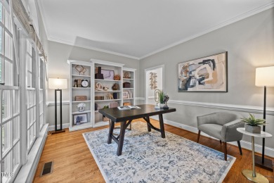 Nestled on a desirable corner lot, surrounded by mature trees in on Devils Ridge Golf Club in North Carolina - for sale on GolfHomes.com, golf home, golf lot