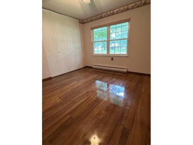 One of the biggest units in the Leisure Village complex. This on Leisure Village Golf Course in New York - for sale on GolfHomes.com, golf home, golf lot