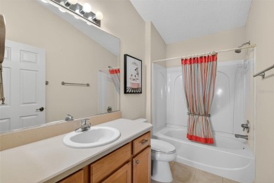 TURNKEY 3/2 FOXGLOVE COURTYARD VILLA with GOLF FRONT VIEWS, SWIM on The Links of Spruce Creek in Florida - for sale on GolfHomes.com, golf home, golf lot