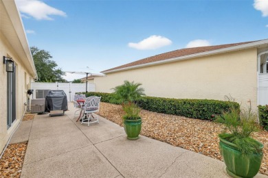 TURNKEY 3/2 FOXGLOVE COURTYARD VILLA with GOLF FRONT VIEWS, SWIM on The Links of Spruce Creek in Florida - for sale on GolfHomes.com, golf home, golf lot