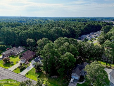 Welcome to this beautifully maintained home located in the gated on Brunswick Plantation and Golf Resorts in North Carolina - for sale on GolfHomes.com, golf home, golf lot