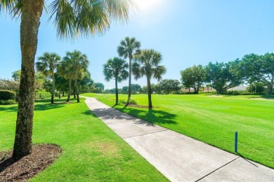 Paradise and a FULL GOLF MEMBERSHIP await you at 138 Isle Drive! on BallenIsles Golf and Country Club in Florida - for sale on GolfHomes.com, golf home, golf lot