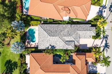 Paradise and a FULL GOLF MEMBERSHIP await you at 138 Isle Drive! on BallenIsles Golf and Country Club in Florida - for sale on GolfHomes.com, golf home, golf lot