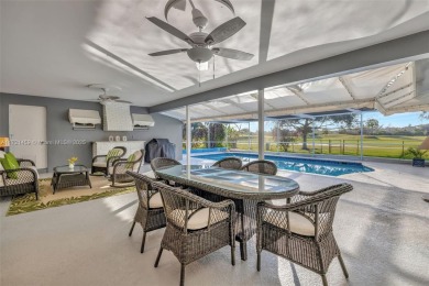 5-bed, 3-bath home on over 19,000 sq. ft. of land, offering on Plantation Preserve Golf Course in Florida - for sale on GolfHomes.com, golf home, golf lot