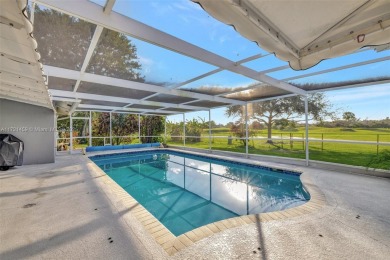 5-bed, 3-bath home on over 19,000 sq. ft. of land, offering on Plantation Preserve Golf Course in Florida - for sale on GolfHomes.com, golf home, golf lot