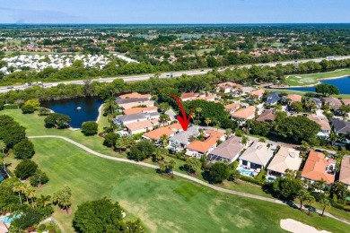 Paradise and a FULL GOLF MEMBERSHIP await you at 138 Isle Drive! on BallenIsles Golf and Country Club in Florida - for sale on GolfHomes.com, golf home, golf lot