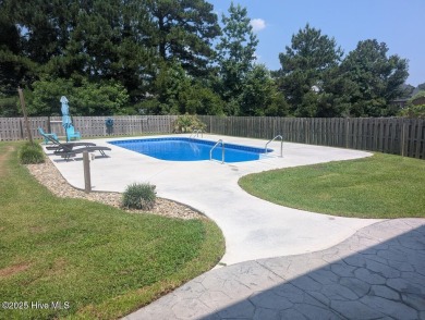 This four bedrooom, two and a half bath has everything you could on Rock Creek Country Club in North Carolina - for sale on GolfHomes.com, golf home, golf lot