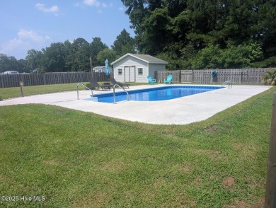 This four bedrooom, two and a half bath has everything you could on Rock Creek Country Club in North Carolina - for sale on GolfHomes.com, golf home, golf lot